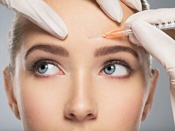 girl getting injected in forehead with Botox in Shrewsbury, NJ